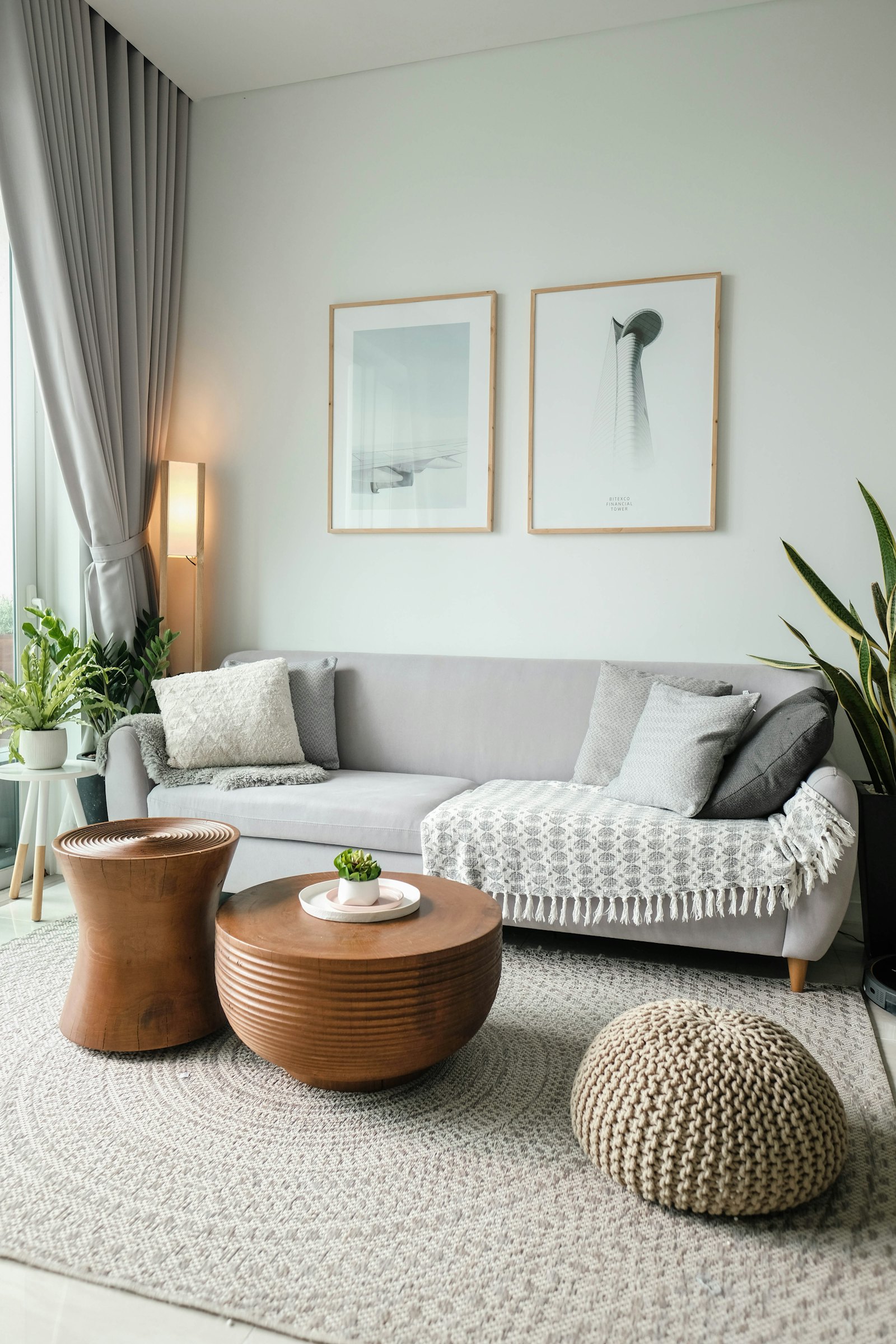 Calm renovated living room with a grey sofa