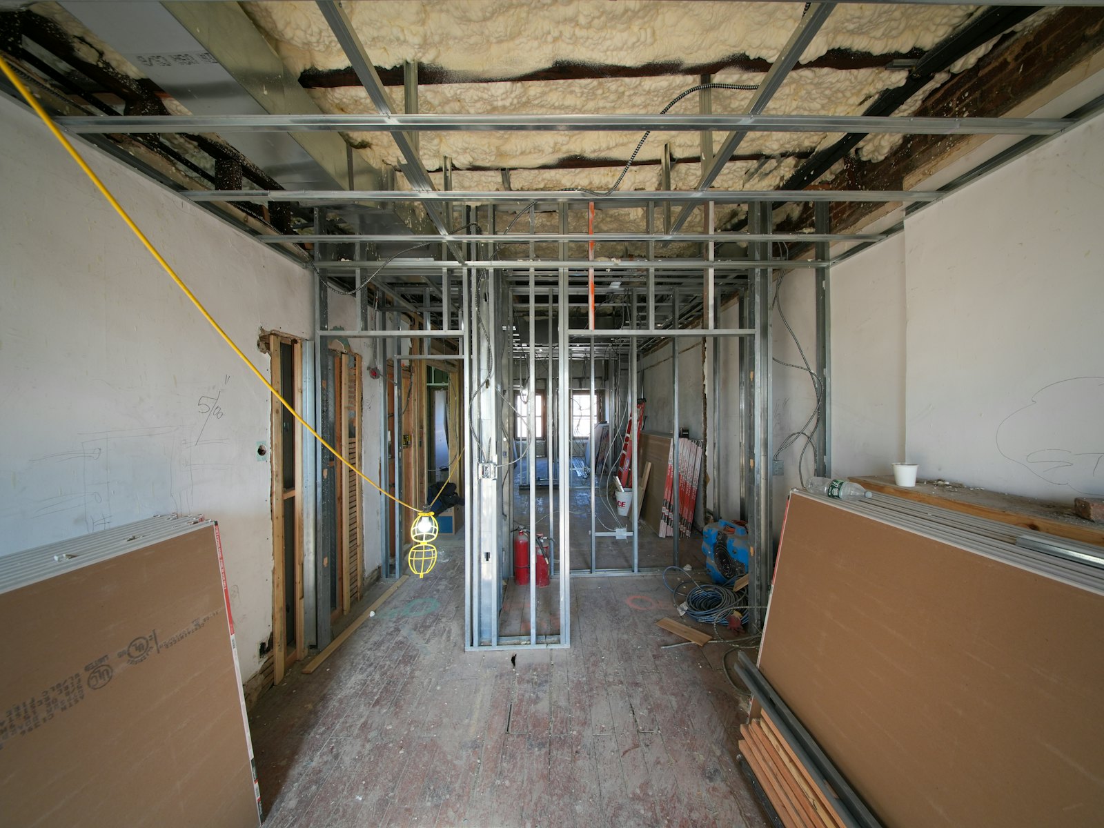 Interior framing with metal studs and drywall sheets